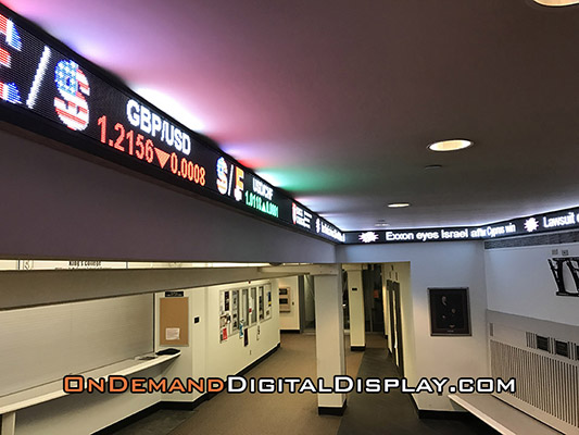 LED stock ticker display wrapping lobby walls